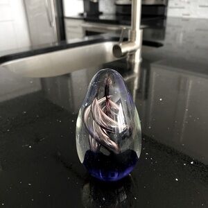 Ethereal Glass Orb with Swirling Design
